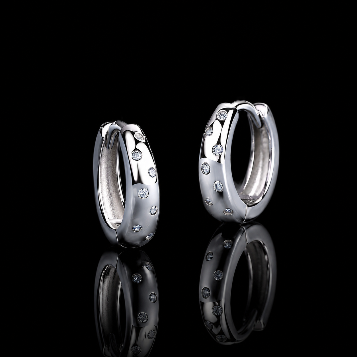The Scattered Moissanite Huggies