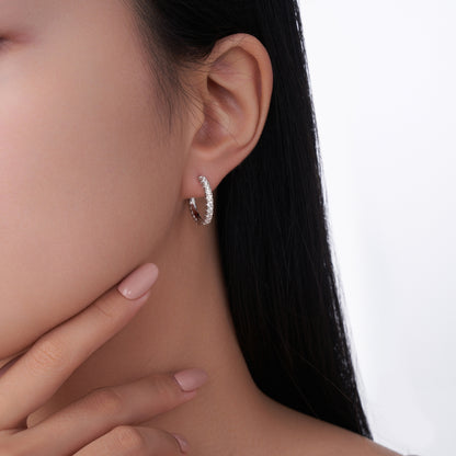 The Pavé Moissanite Huggie Hoops
